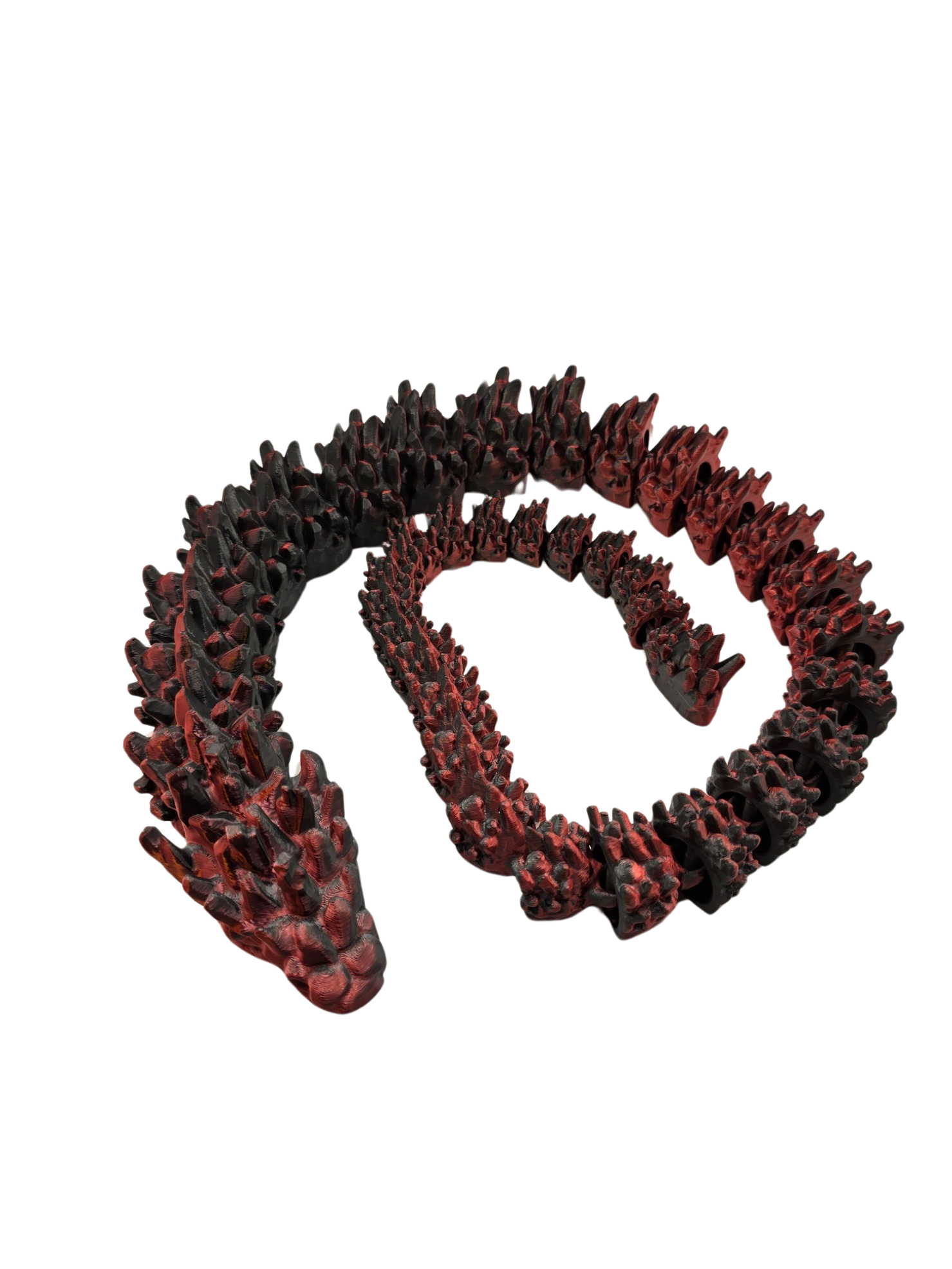 Bewegliche Lava-Drachen-Schlangen auf schwarzer Fläche

