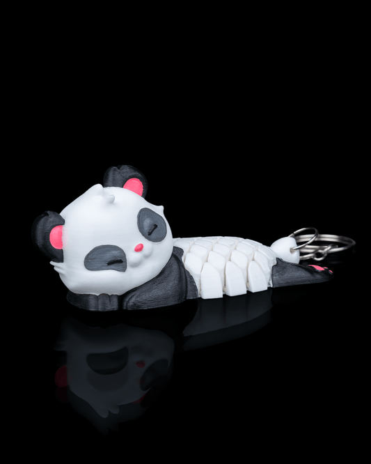 Panda-Schlüsselanhänger beweglich liegend


