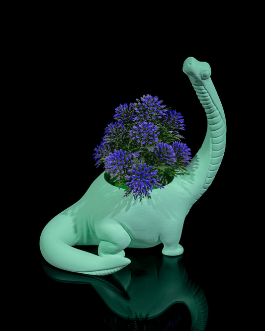 Dinosaurier Blumentopf zweite Version bepflanzt

