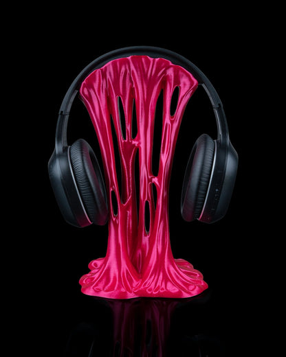 Headset-Halter im pinken Sticky-Splash-Design von vorne mit Headset

