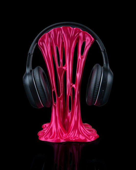 Headset-Halter im pinken Sticky-Splash-Design von vorne mit Headset

