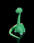 Grüner Dino-Handyhalter ohne Smartphone, Dreiviertelansicht vor schwarzem Hintergrund