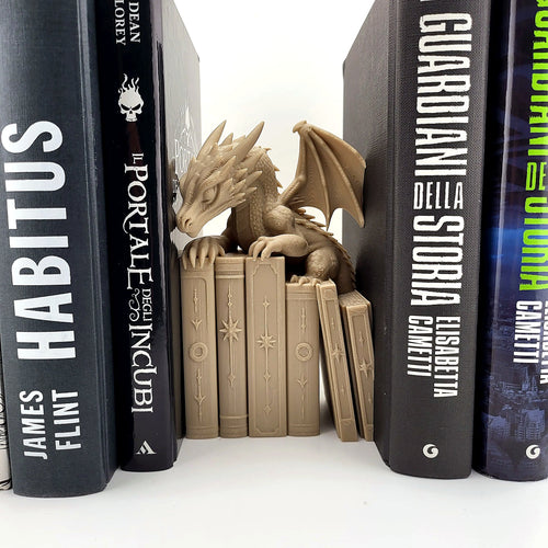 Close-up of the dragon bookend, scale and wing details visible