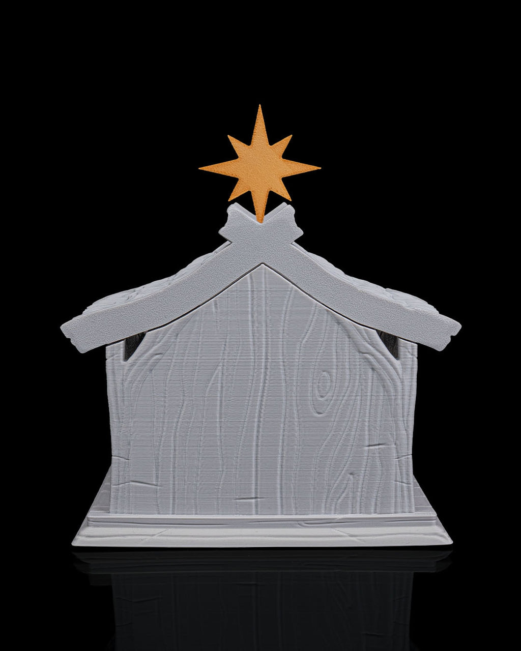 LED Weihnachtskrippe Bright Nativity, Frontalansicht mit Dach und goldenem Stern, Innenraum unbeleuchtet im Schatten – Münch3D