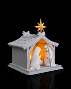 LED Weihnachtskrippe Bright Nativity, Ansicht schräg von vorne mit warmem Licht um Maria und Josef – Münch3D