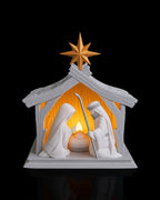 LED Weihnachtskrippe Bright Nativity, Frontalansicht mit Maria, Josef und goldenem Stern, warm beleuchtet, 19 cm – Münch3D