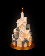 LED Winterdorf Tischlampe Winter Village Turm, leicht gedrehte Ansicht beleuchtet mit goldenem Stern – Münch3D