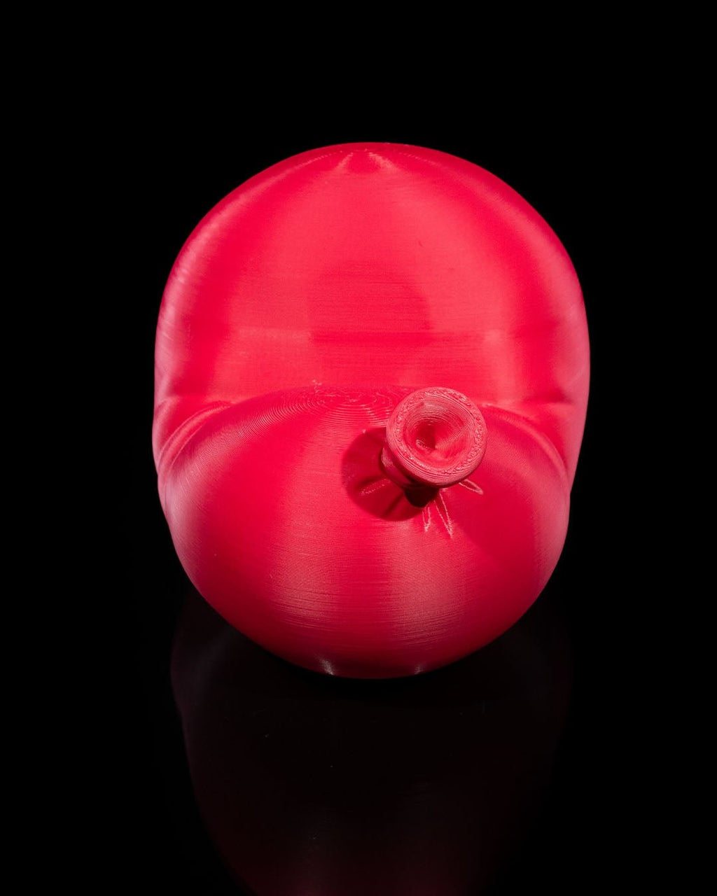Roter Luftballon-Handyhalter ohne Smartphone, Frontalansicht mit mittig sichtbarem Ballonknoten