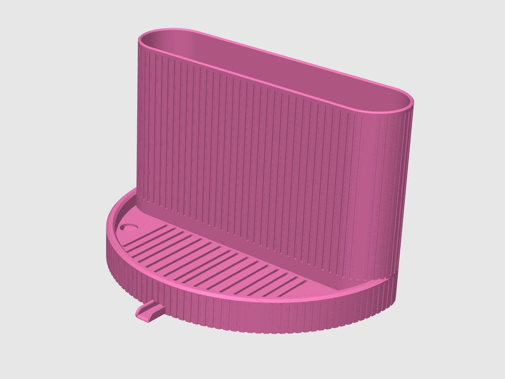 3D-Rendering des Spülbecken-Organizers in Sakura Rosa: hohes ovales Fach mit geriffelter Struktur, runde Basis mit gerillter Ablagefläche und Ablaufauslauf an der Vorderkante.